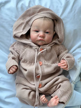 Bebê Reborn Theo de 49cm com roupinha e acessórios – boneco realista ideal para presente Varialle
