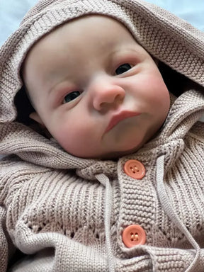 Bebê Reborn Theo de 49cm com roupinha e acessórios – boneco realista ideal para presente Varialle