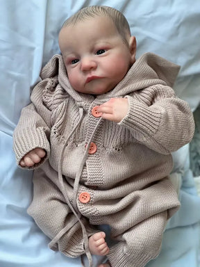 Bebê Reborn Theo de 49cm com roupinha e acessórios – boneco realista ideal para presente Varialle