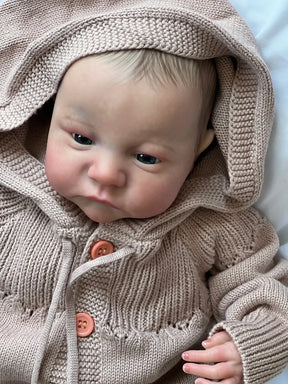 Bebê Reborn Theo de 49cm com roupinha e acessórios – boneco realista ideal para presente Varialle