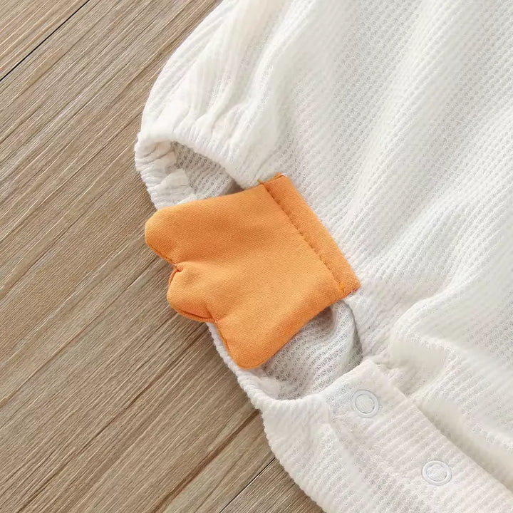 Estilo e praticidade para o dia a dia: Macacão Bebê Patinho 3D em algodão, perfeito para passeios e brincadeiras. Varialle