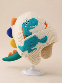 Criança usando gorro de dinossauro infantil de tricô, ideal para o inverno Varialle